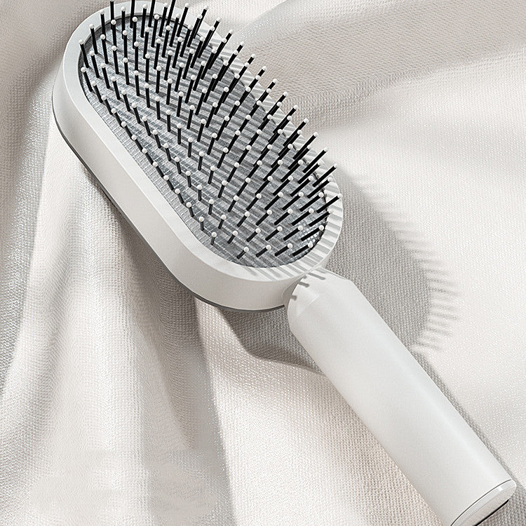 Cepillo de Cabello Auto-Limpiante