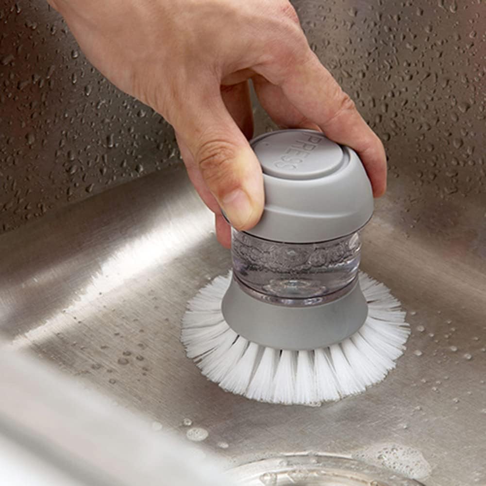 Cepillo de mano dispensador de jabon de cocina.
