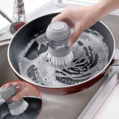 Cepillo de mano dispensador de jabon de cocina.